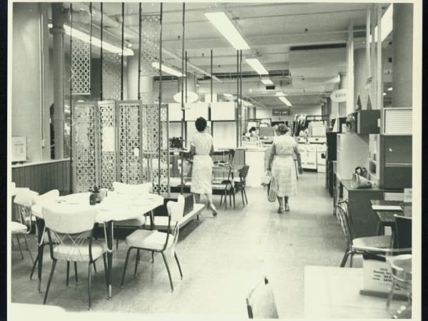 Women shopping at Stix, Baer, and Fuller, northeast corner of Seventh Street and Washington Avenue