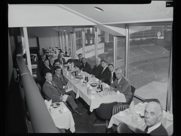 Men dining at the Stadium Club at Busch Memorial Stadium