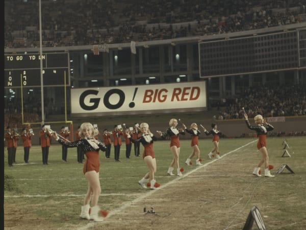 ST. LOUIS CARDINALS FOOTBALL TEAM CHEERLEADERS PERFORMING IN BUSCH STADIUM