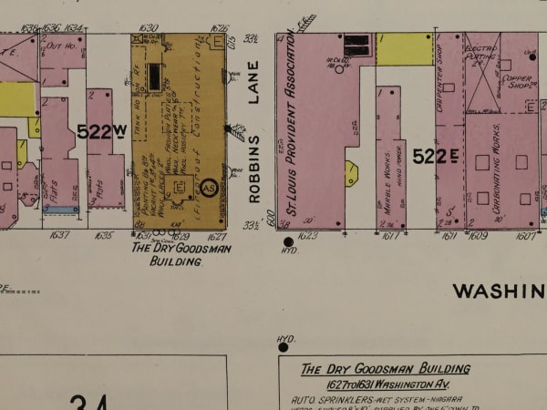 The 1635–43 Washington site on the 1909 Sanborn fire insurance map, a decade before the Central Shoe Company Building: flats and a boarding house at the corner of 17th Street, next door to the new Dry Goodsman Building.