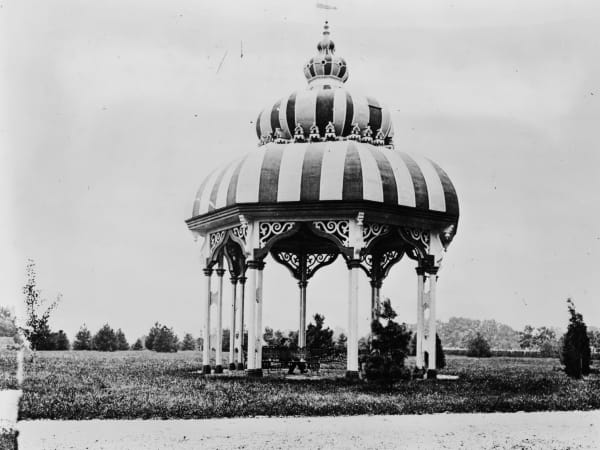 Turkish Pavilion: The pavilion in 1875 as the park’s summer and pigeon house, with two roof tiers and the roosts at the joint between them, before the 1892 lower tier. HABS copy of a stereograph from the Fuhrman Collection glass negatives at the Scottish Rite Library.