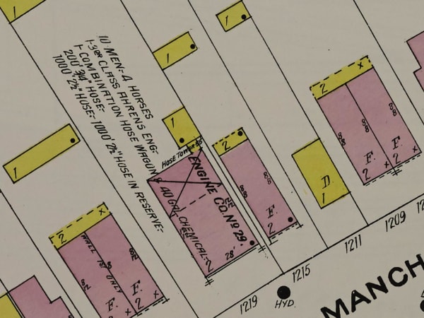 Engine House No. 29: Engine Co. No. 29 on the 1909 Sanborn fire insurance map, on what was then Old Manchester Road: a two-story brick house 28 feet wide with a 55-foot hose tower at the rear. The note beside it lists the company: 10 men, 4 horses, a third-class Ahrens engine, a combination hose wagon and a 40-gallon chemical engine.