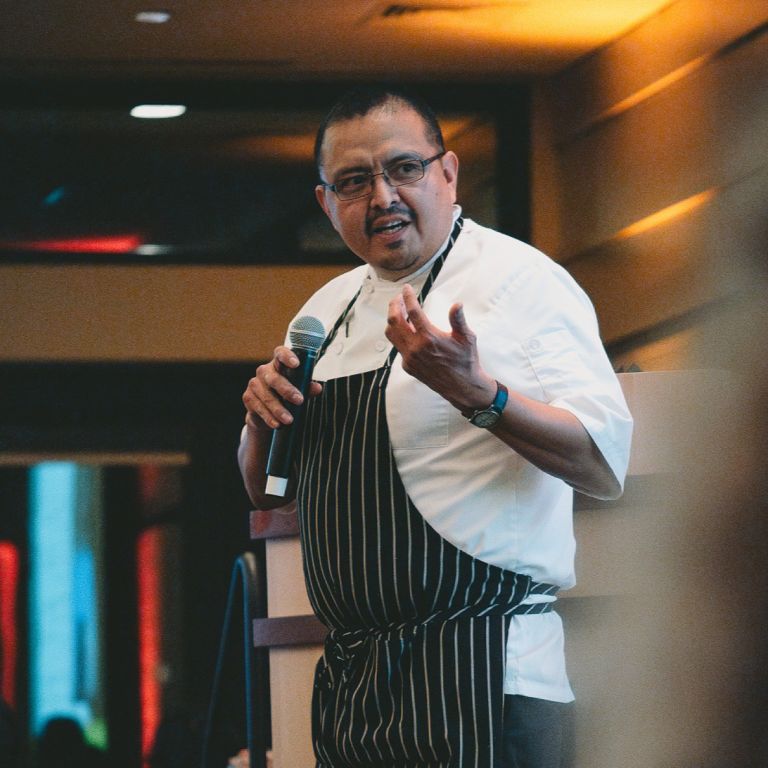Chef Nephi Craig speaking at the 2024 Celebration of First Foods Dinner.