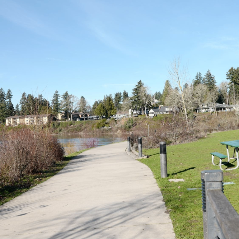 a paved walk along a river