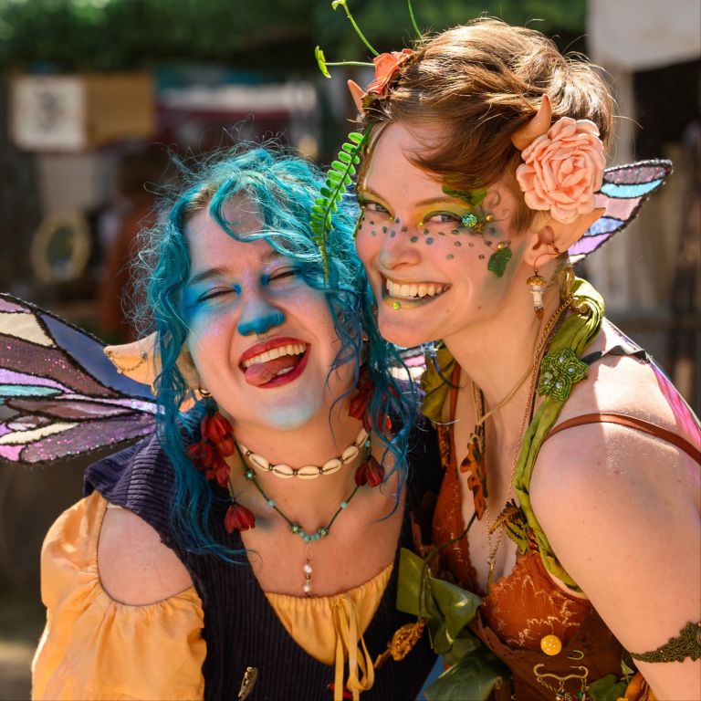 two people dressed as fairies