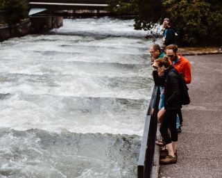 People observe a fish ladder at Bonneville Dam