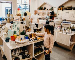 people shopping in a store full of interesting knick knacks