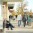 Shoppers stroll from store to store at Cascade Station.