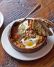 Brunch at Tasty n Sons includes their legendary shakshuka.