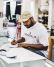 SneakerWeek founder Herbert Smith works on a new shoe design.
