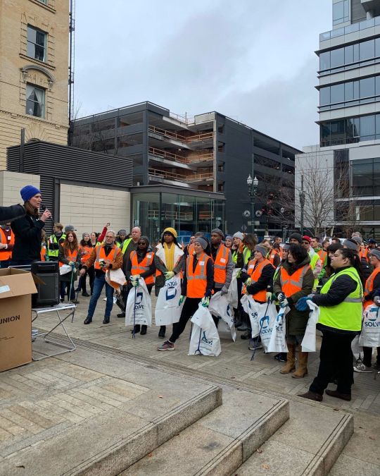 More than 150 volunteers met at Director Park to participate in a clean-up of downtown Portland, organized by local hotels.