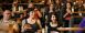 Film fans enjoy beer and pizza with a movie at the Hollywood Theatre.