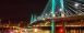 The Portland Spirit floats by Tilikum Crossing during the Winter Light Festival.
