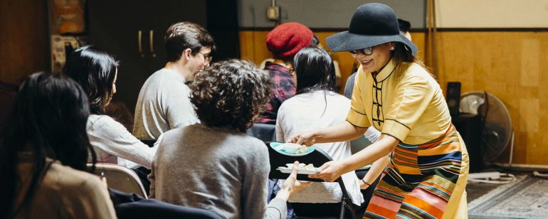 Chef Tenzin “Kyikyi” Yeshi-Men hands out homemade Himalayan dumplings at a Tender Table event.