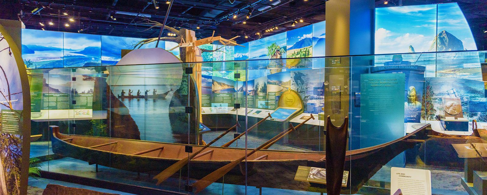 a museum exhibit featuring a wooden canoe