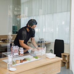 Chef Vincent Nguyen assists a customer at Berlu.