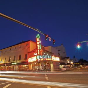 The Bagdad Theater’s neon sign lights up the night on Hawthorne Boulevard.