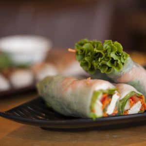 three salad rolls on a plate