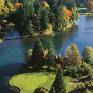 arial shot of golf course with lake