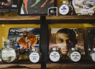 Hip-hop records and jars of rapper-themed cannabis decorate Green Muse Dispensary.