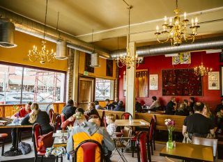 Customers dine at Po’Shines Café de la Soul.