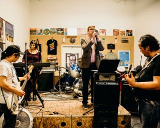 a band performing in a record shop