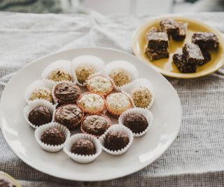 two plates full of a variety of cannabis chocolates