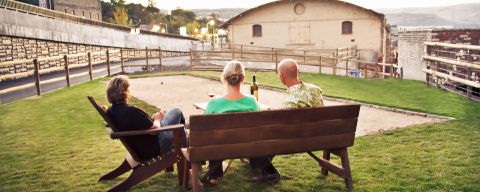 peaple sitting on outdoor benches