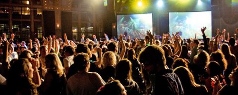 a crowd dancing at a nightclub