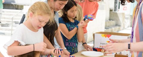 a group of children participate in arts and crafts activities at the Portland Art Museum