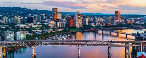 Aerial image overlooking urban city skyline with view of river