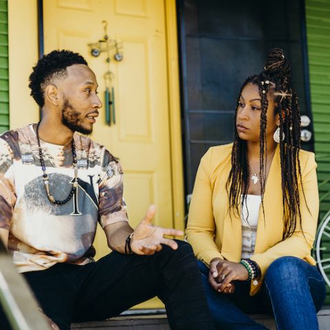 Founders Karanja Crews and Nicole Kennedy sit outside Green Muse Dispensary.