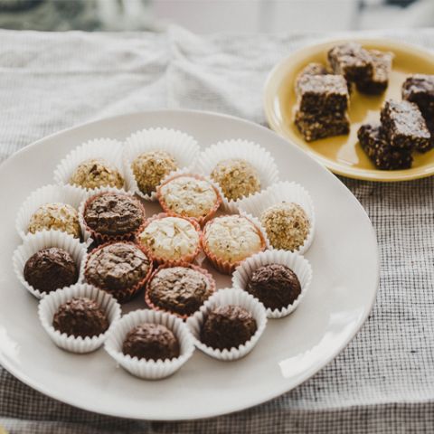 two plates full of a variety of cannabis chocolates