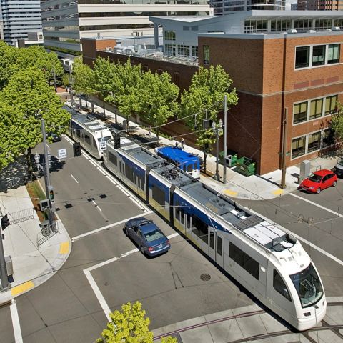 MAX light rail running on a downtown street