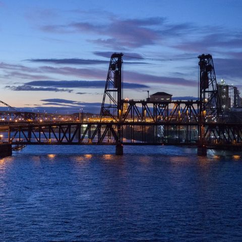 two city bridges at sunset