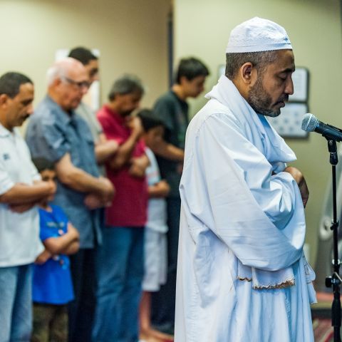 men in prayer for Ramadan