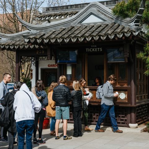 Visitors in line at the ticket booth at Lan Su Chinese Garden