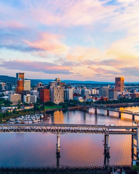 Aerial image overlooking urban city skyline with view of river