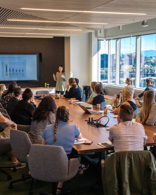 Local business partners receive training in the Hawthorne Bridge room