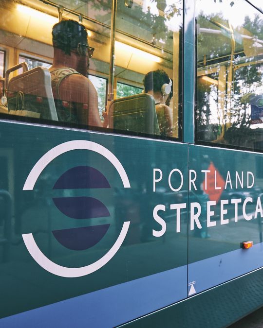 people traveling inside the Portland Streetcar