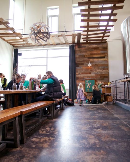 people enjoying beer at a brewery
