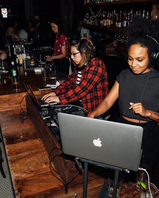 djs at a bar