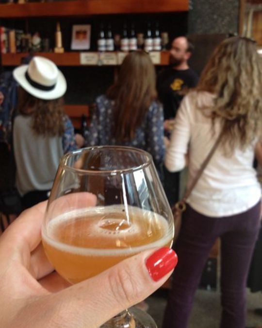 A group of young women touring and tasting at Burnside Brewing.