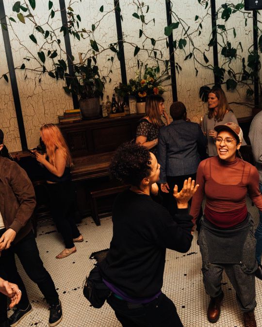 people dancing on a dance floor