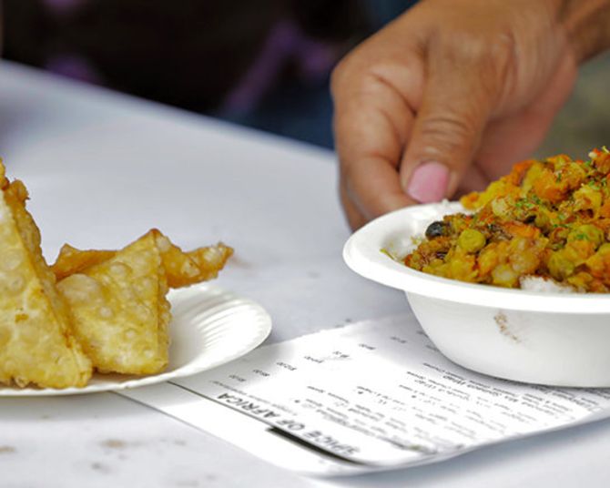 a small plate and a bowl of African food