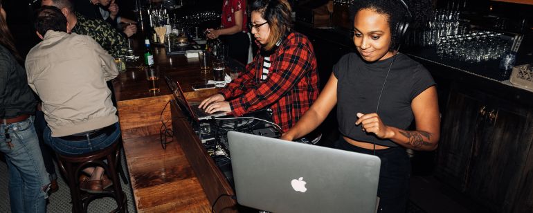 djs at a bar