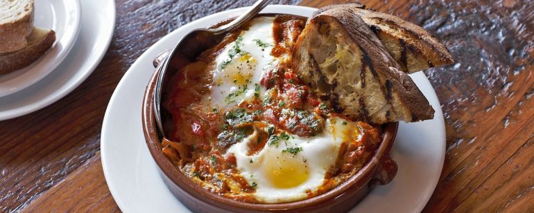 A savory breakfast dish with egg and toasted bread