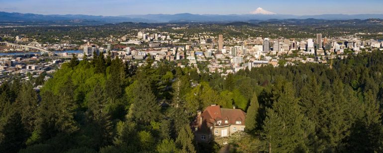 Aerial view of Pittock mansion and the Portland skyline