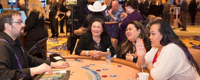 three women at a gaming table