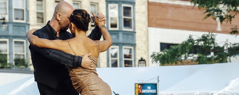 A man and woman dancing tango